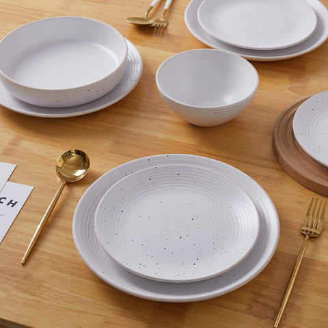 Stone Lain Lauren styled on table with linens showing how set complements home decor