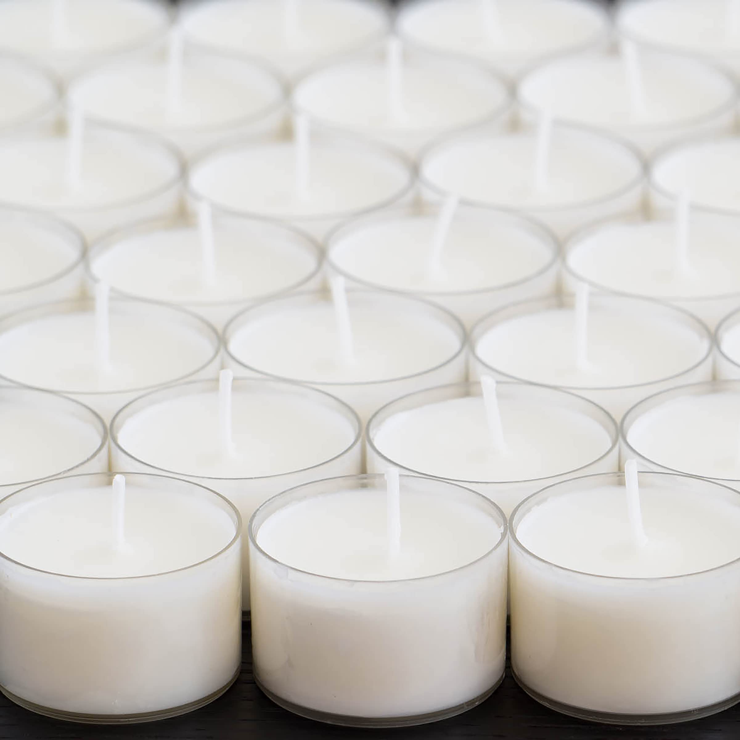 Stonebriar tea lights arranged in a centerpiece for wedding or event mood lighting