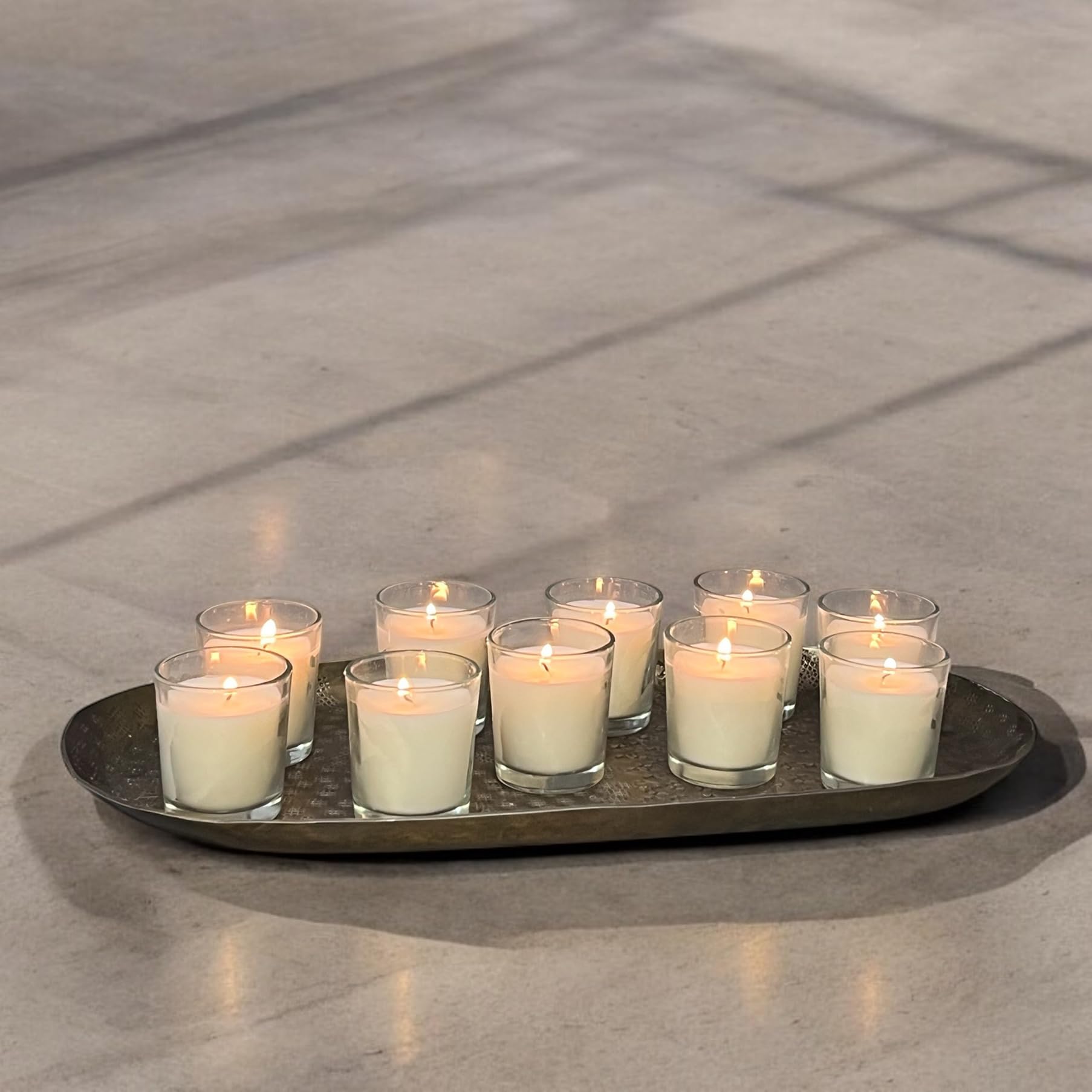 Stonebriar votive on dining table next to dinnerware for subtle lighting