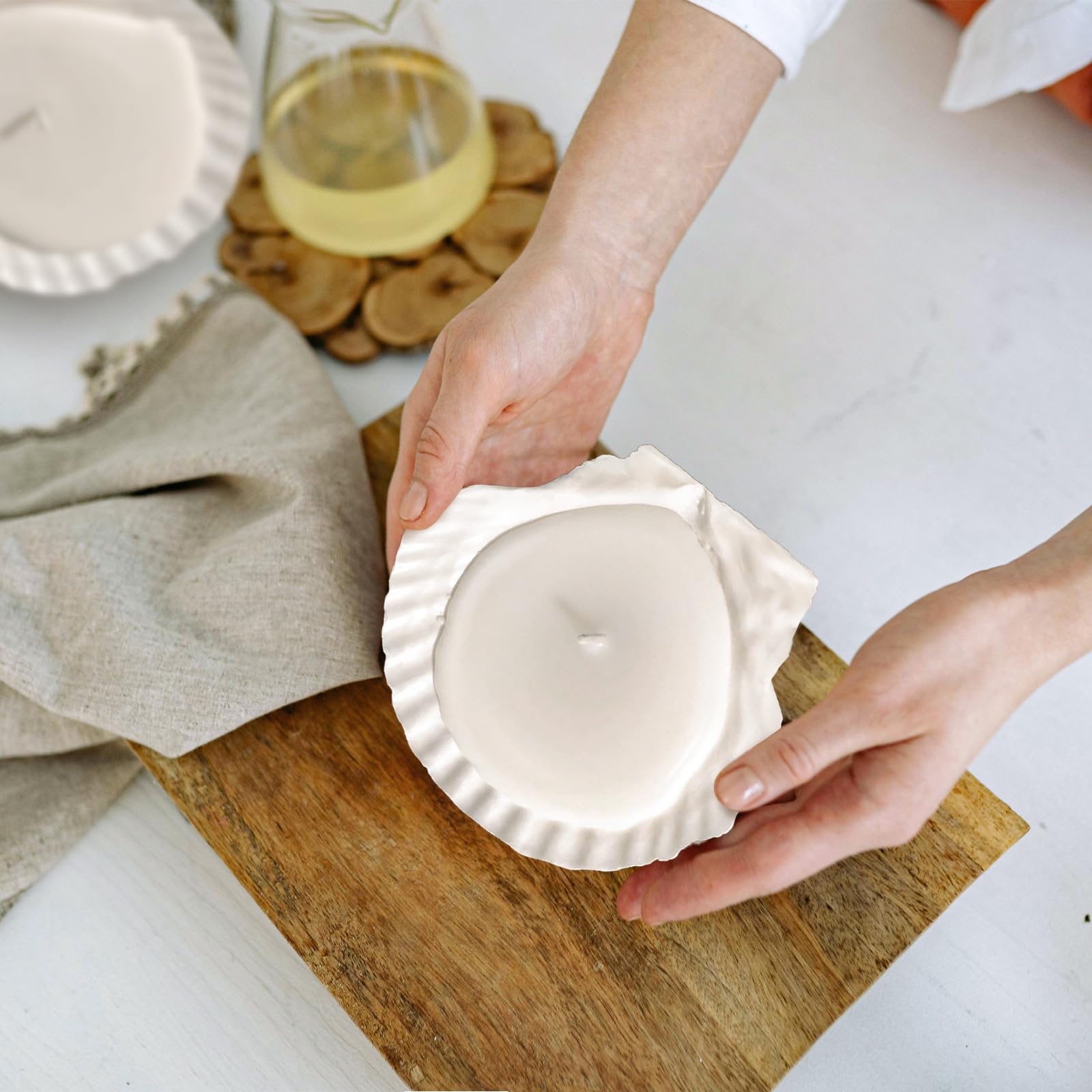 stonechic scallop shell used as candle holder showing decorative appeal benefit
