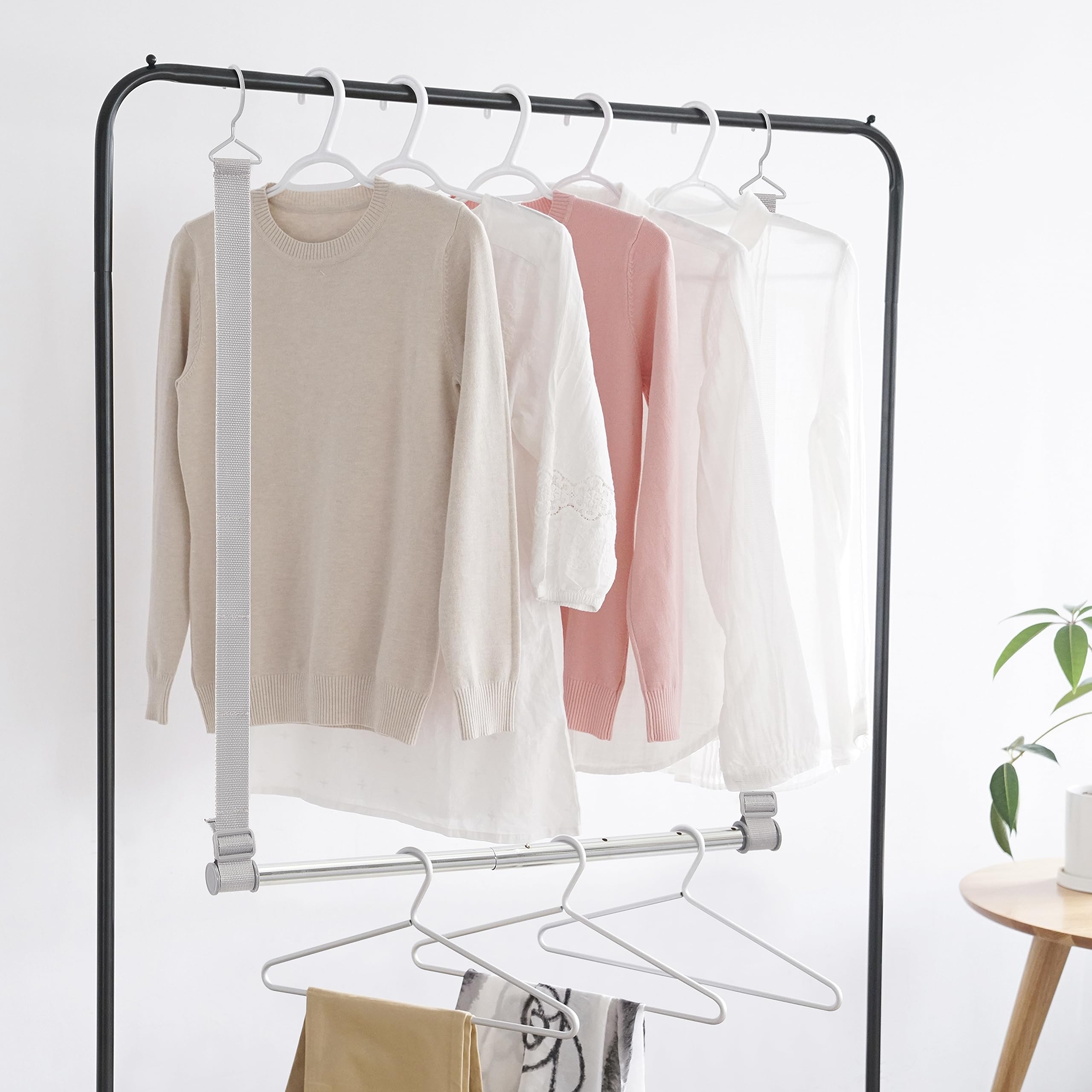 STORAGE MANIAC showing pants and shirts organized to save space