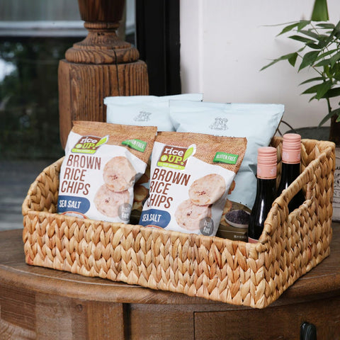 Stylave baskets on kitchen shelf storing grains and cans to maximize shelf space