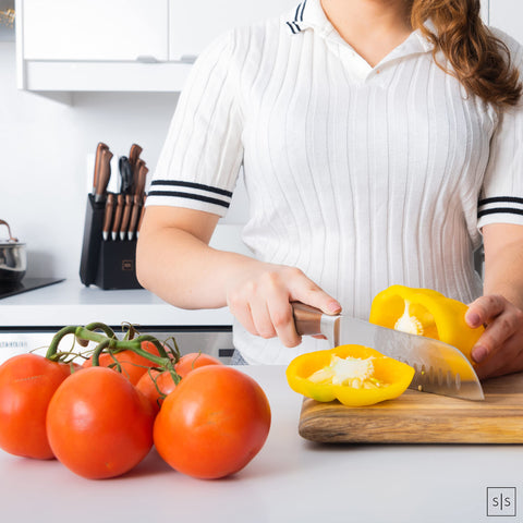 STYLED SETTINGS kitchen shears and utility knife arranged, versatile prep tools