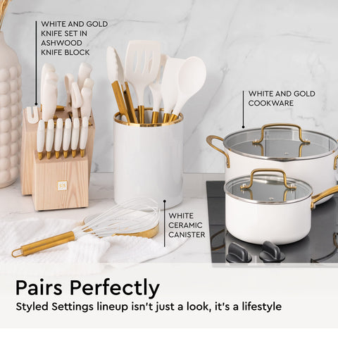 STYLED SETTINGS utensils arranged in a white holder for neat storage and countertop styling