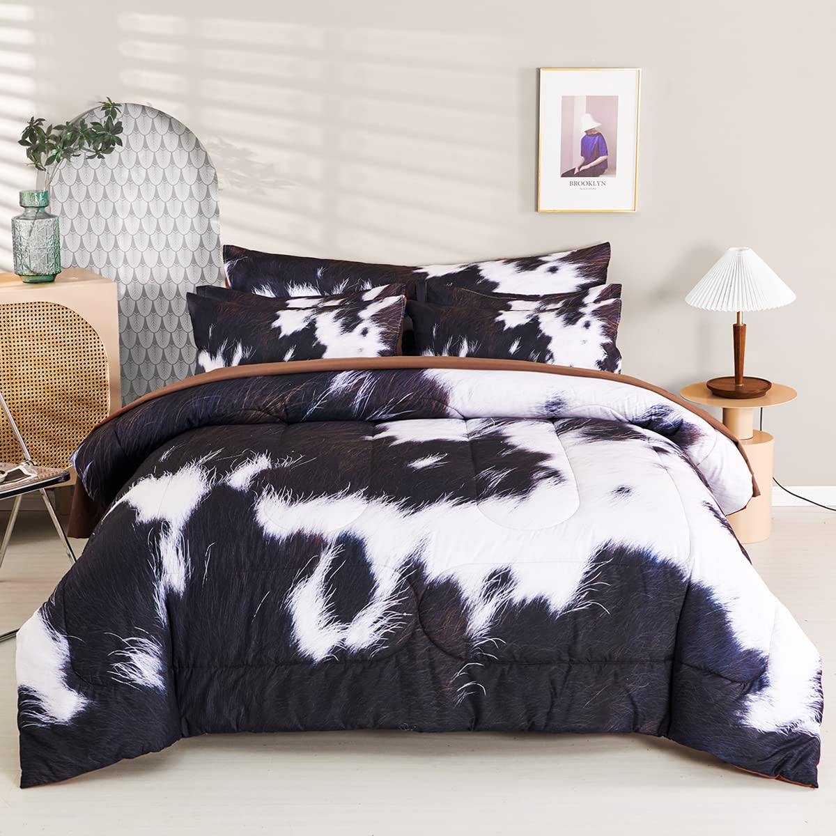 SUCSES front view of cow print comforter showcasing rustic aesthetic and cozy warmth