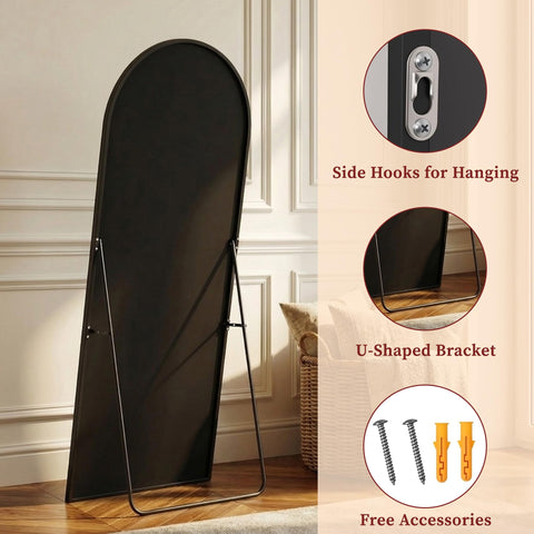 Suidia mirror next to person for scale demonstrating full head-to-toe reflection