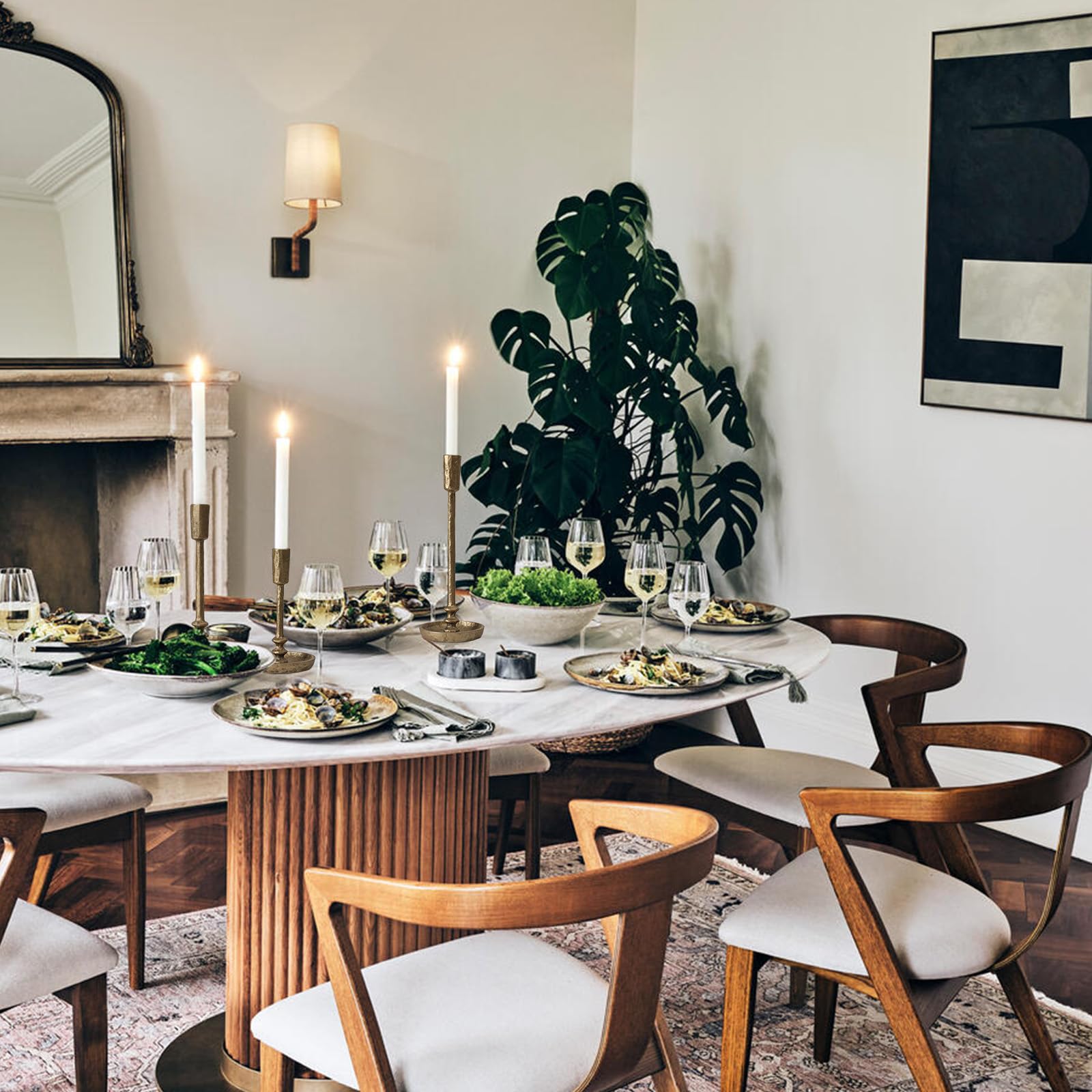 SUJUN candle holders in dining centerpiece creating warm layered lighting
