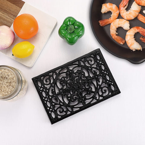 Sumnacon trivet on tabletop in farmhouse setting adding decorative charm