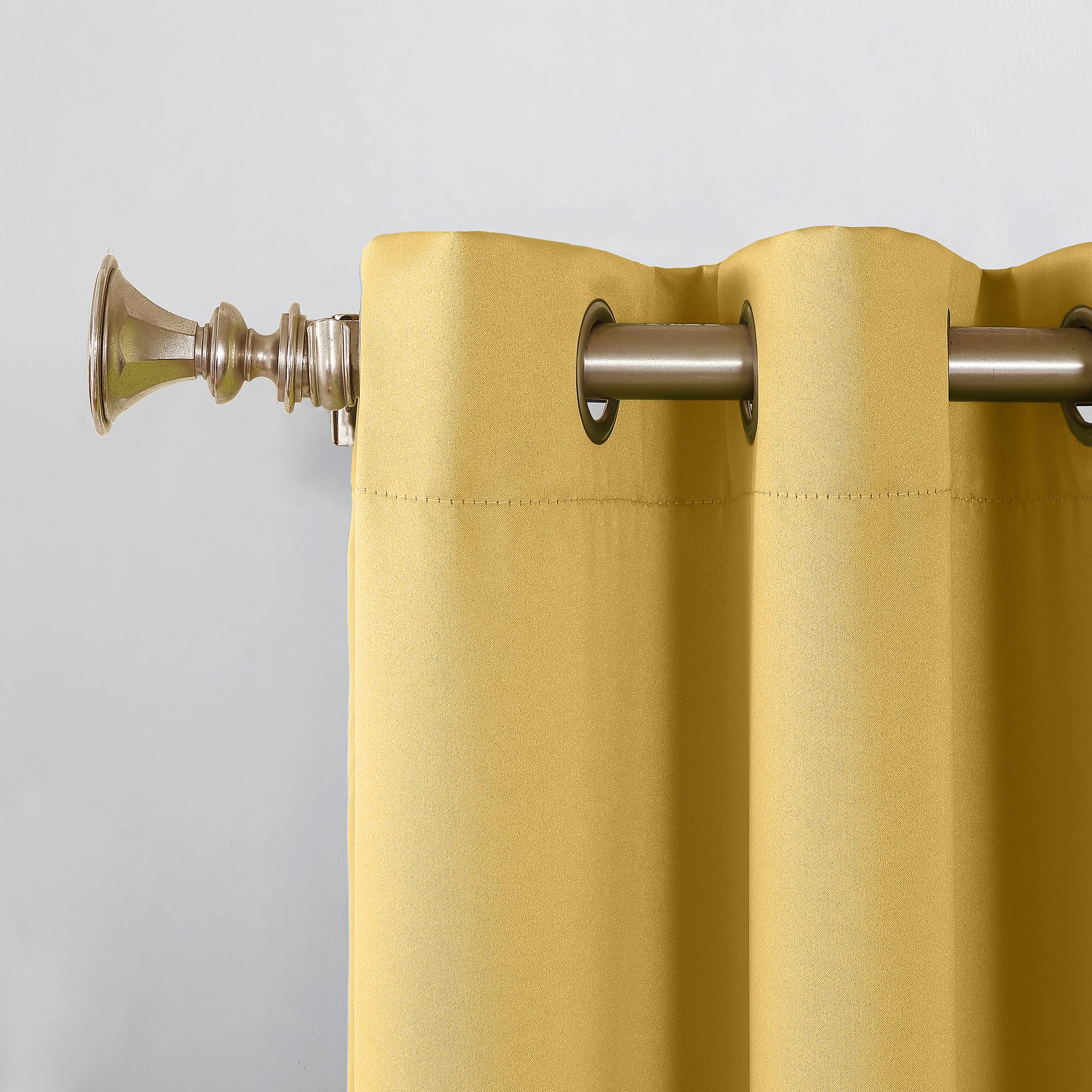 Sun Zero Barrow metal grommet detail for easy hanging and smooth glide