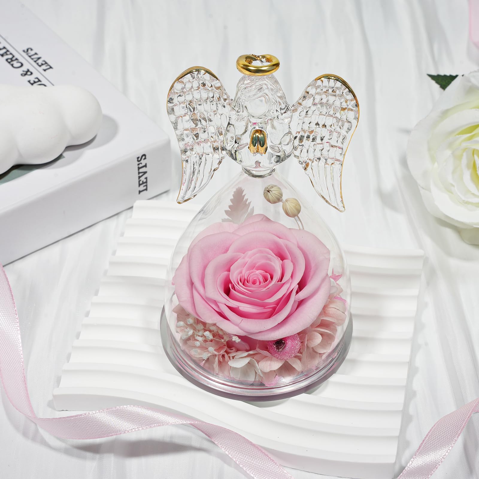 Sunia angel displayed on bedside table adding sentimental decor