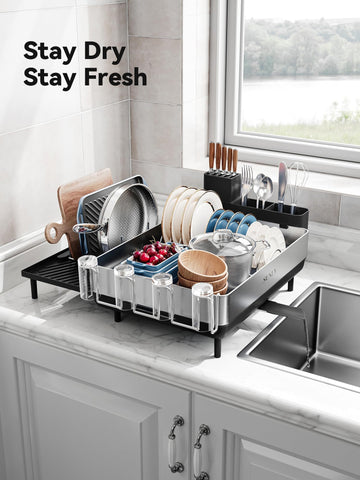 SUNLY scale comparison on counter showing compact collapsed size and space-saving benefit