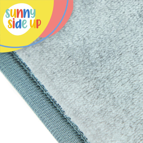 Sunny Side Up care label detail, machine wash cold for long-lasting color