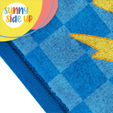 Sunny Side Up child using blanket on airplane provides warmth and calm