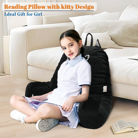 SUNSIDE cat pillow on a bed supporting a reader for relaxation