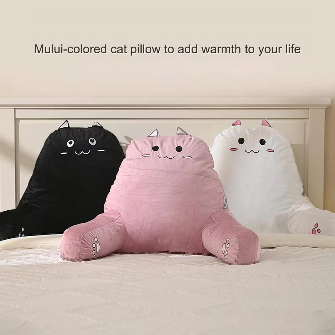 SUNSIDE cat pillow next to a book to show scale and size