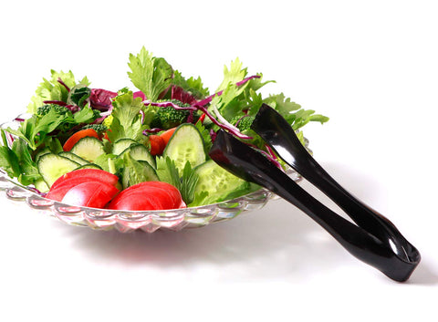 supernal utensils arranged on buffet table for coordinated presentation