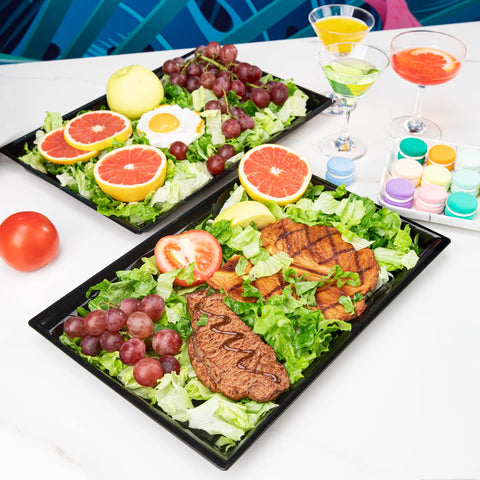 supernal platter next to standard dinner plate showing 15x10 inch size and scale