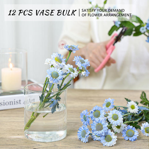 SUPMIND row of vases on table showing wedding decor cohesion and style