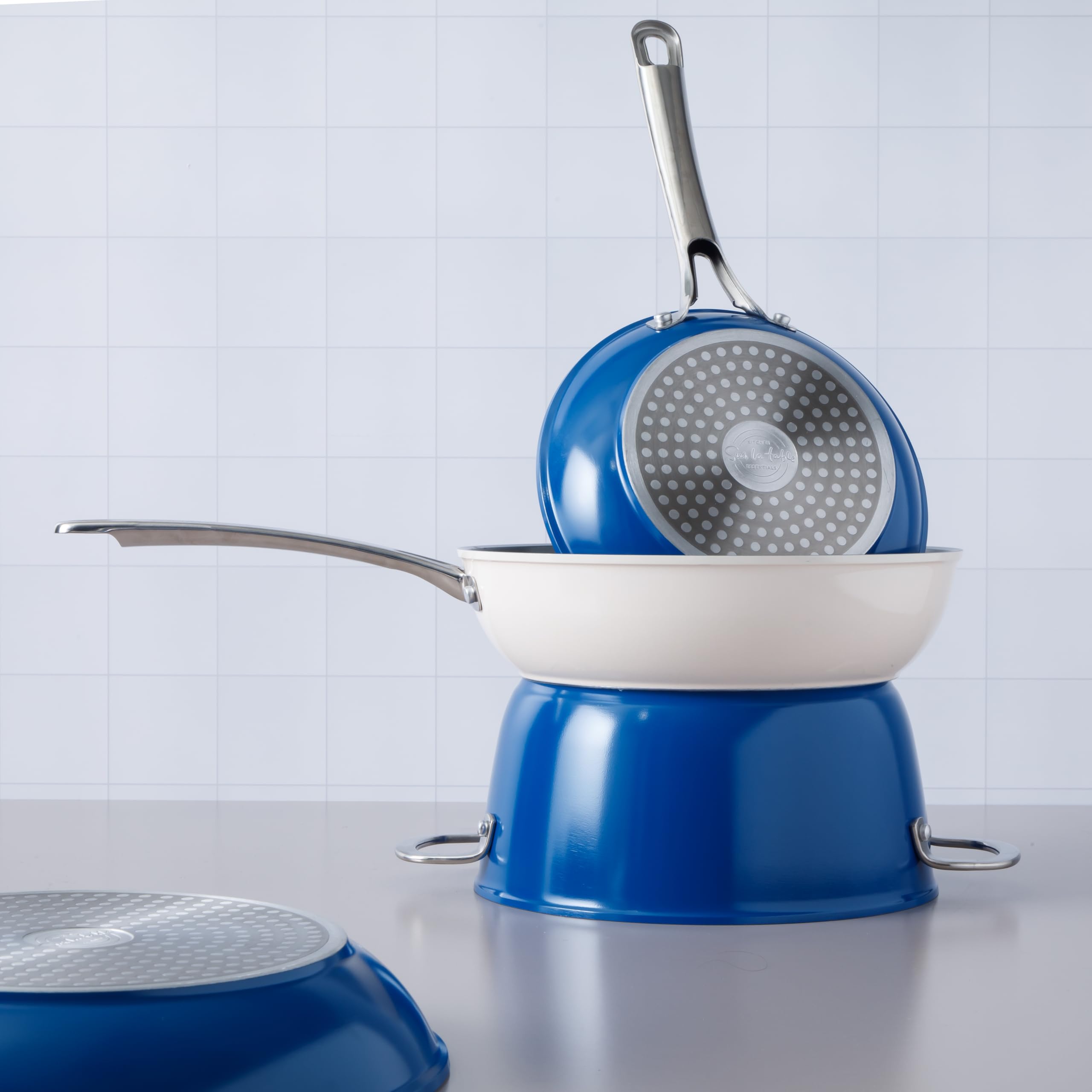 Sur La Table cookware staged in a kitchen lifestyle scene conveying stylish, everyday use benefit