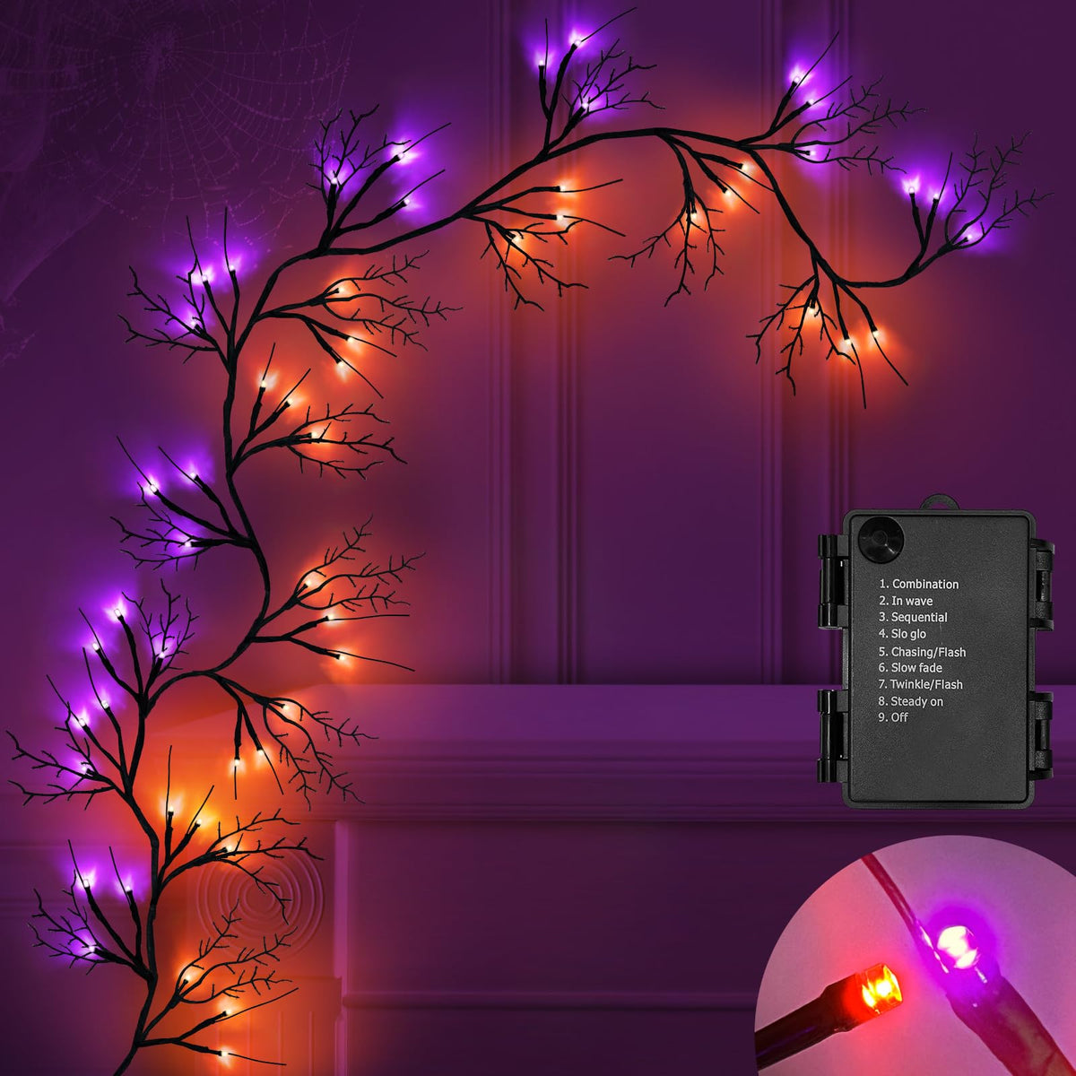 SURCVIO front view of 6 ft willow vine garland showing orange and purple lights and lifelike twigs