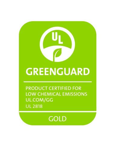 SureGuard protector in a styled bedroom showing fresh pillows and allergen protection