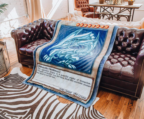 Surreal Entertainment throw draped on sofa creating anime-themed cozy living room atmosphere