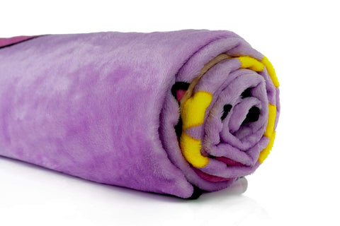 Surreal Entertainment folded blanket demonstrating compact storage and gift readiness