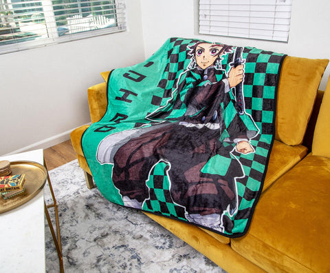 Surreal Entertainment folded throw showing 45x60 size and easy travel portability