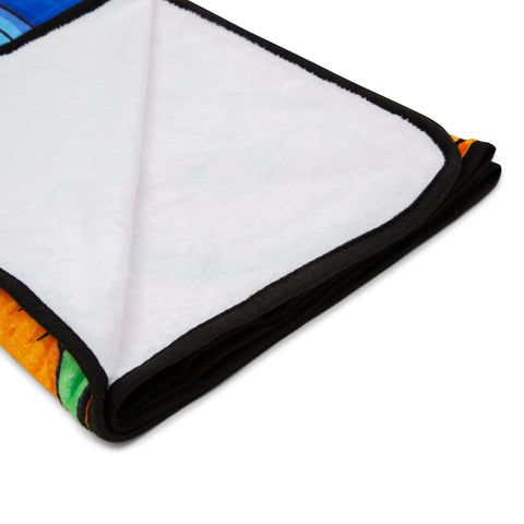 Surreal Entertainment throw draped on sofa adding playful character and color