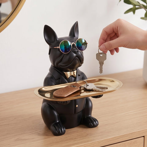 suruim Frenchie holding wallet and keys on tray to demonstrate everyday use