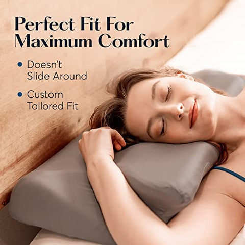 Hand holding SUTERA pillowcase to show scale and adaptable stretch for different pillow lofts
