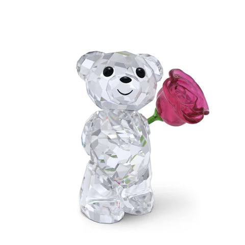 Swarovski Kris Bear front view holding pink rose, sparkles beautifully