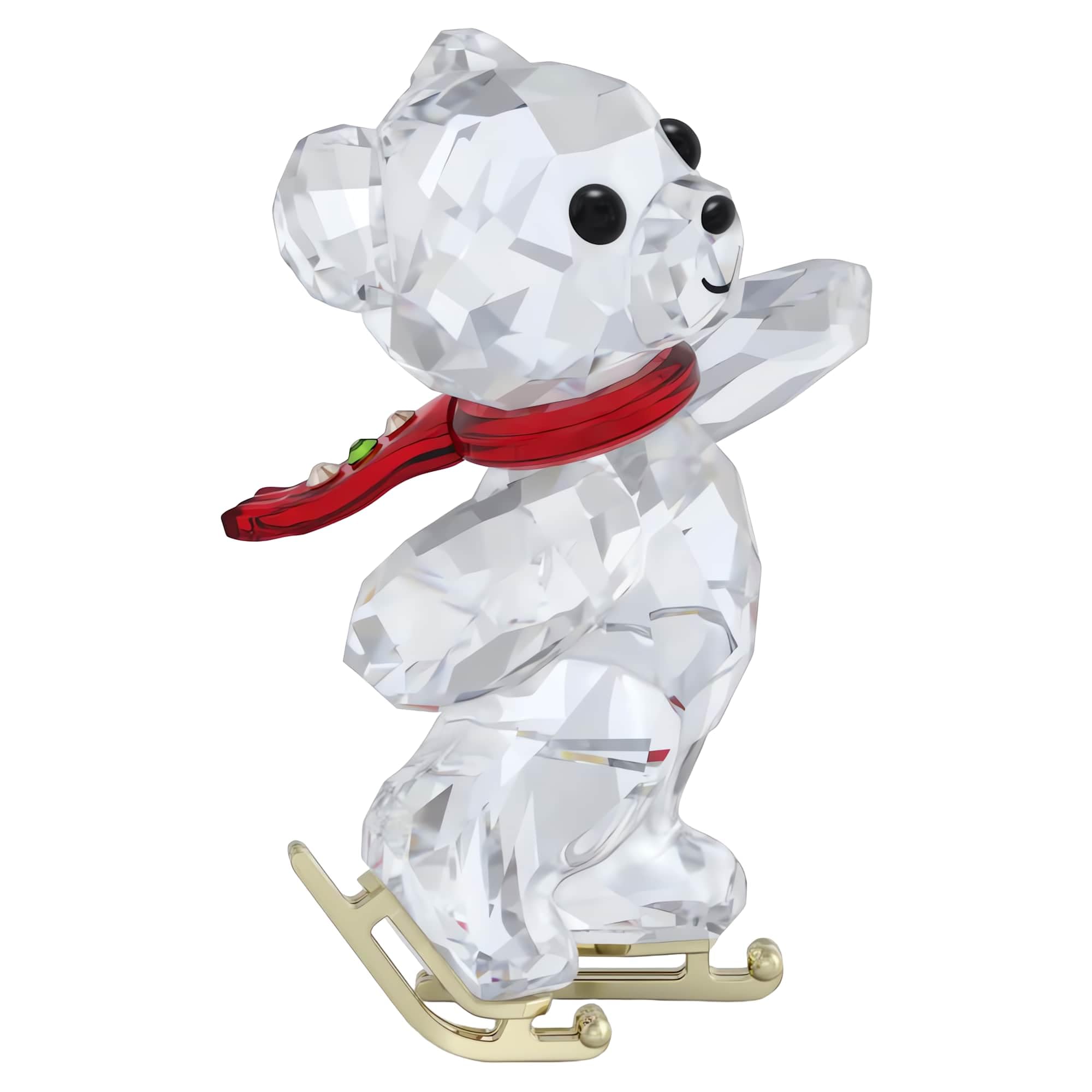 Swarovski Kris Bear close-up of 439 facets and gold-tone skates enhancing sparkle