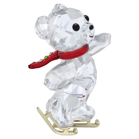 Swarovski Kris Bear close-up of 439 facets and gold-tone skates enhancing sparkle