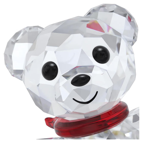 Swarovski Kris Bear staged on a mantel adding festive sparkle to a holiday display
