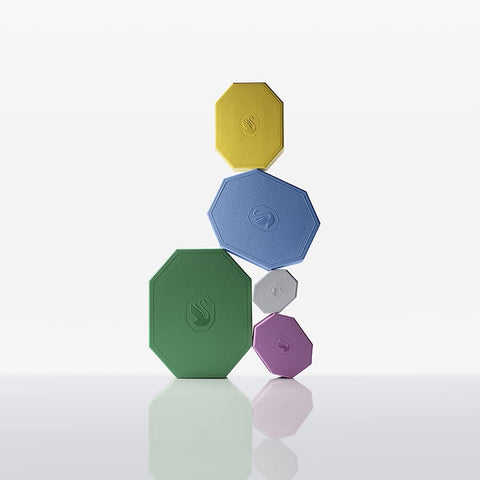 Swarovski ornament beside coin showing small size for versatile display