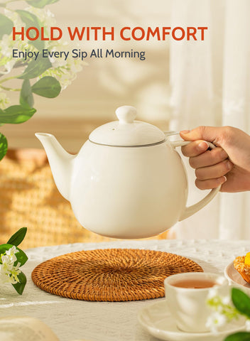 Sweese teapot next to two mugs showing 27 oz capacity ideal for two drinks