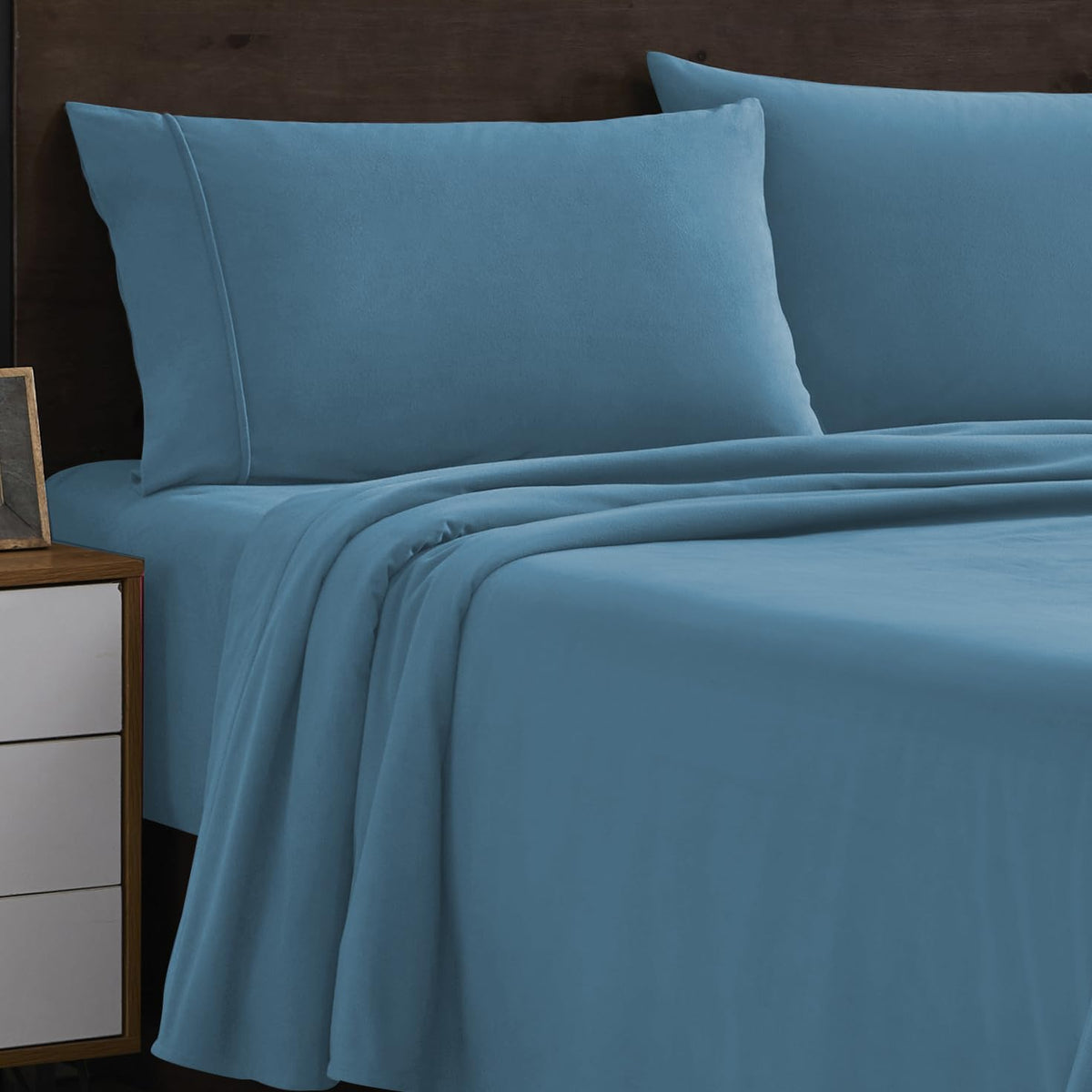 Sweet Home Collection front view showing denim blue sheet set styling and neat presentation