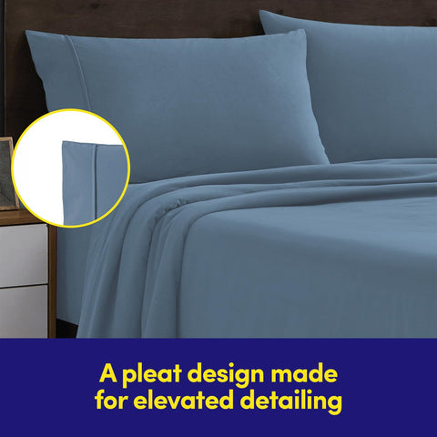 Sweet Home Collection two pillowcases stacked to show matching denim blue and neat finish