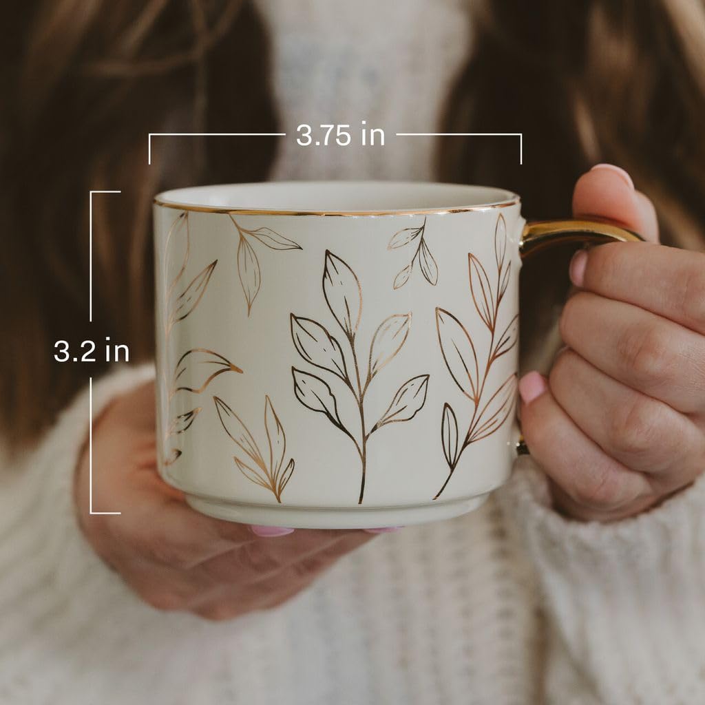 Sweet Water Decor beside a standard mug to show 14oz capacity and clear serving size benefit