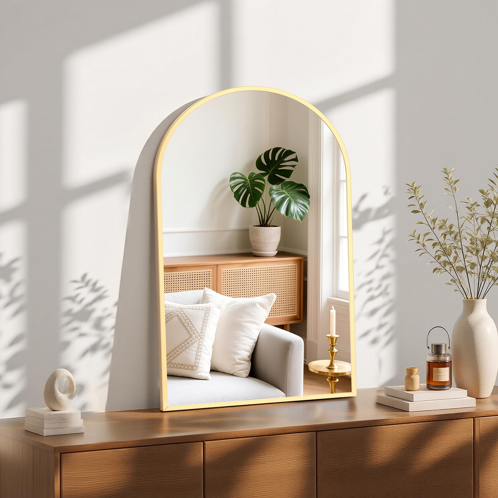 Sweetcrispy mirror in bedroom lifestyle shot adding warmth and layered decor benefit