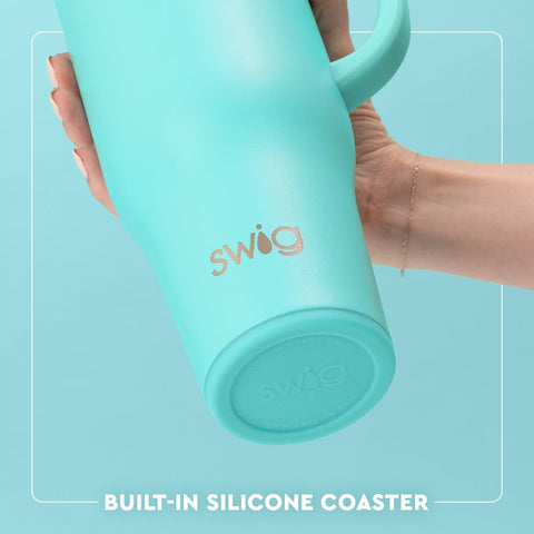 Swig Life in a car cup holder showing travel-friendly fit and convenience benefit