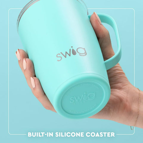 Swig Life tumbler in car cup holder during commute, convenient handle and thermal benefit