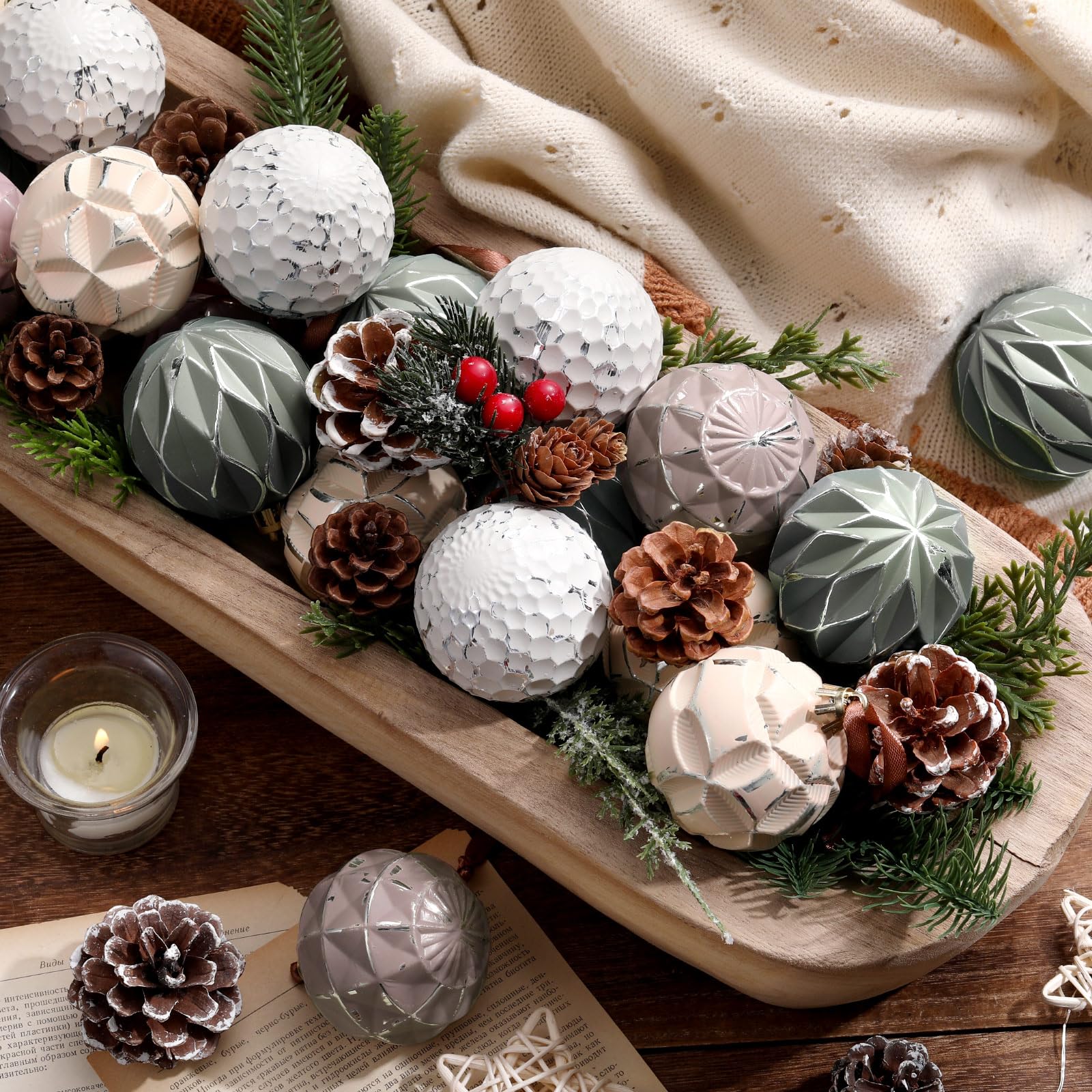 Syhood front view of 24 neutral ornaments showing calm palette and mix
