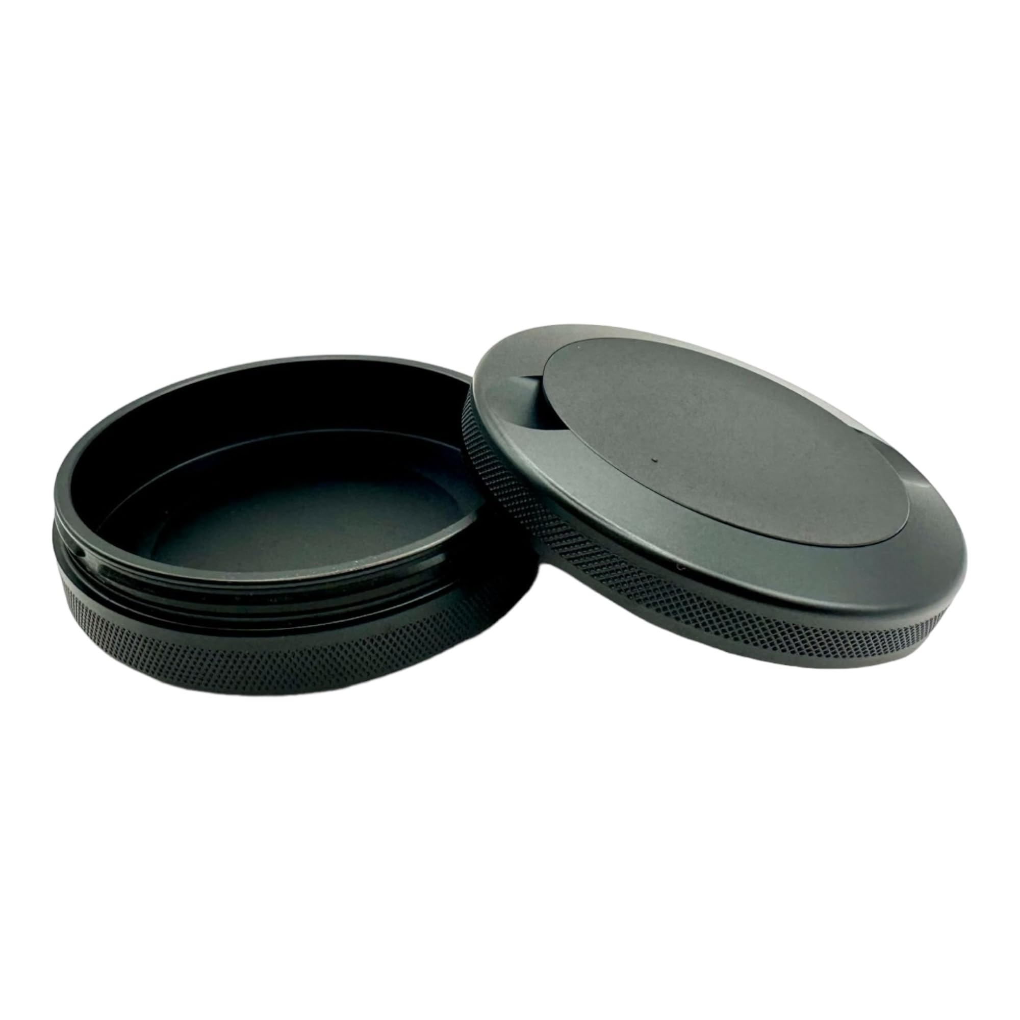 Syn Tin open showing dual compartments and O-ring benefit: organized storage