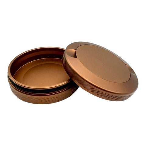 Syn Tin open compartments with sample contents illustrating organized separation