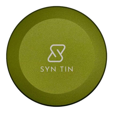 Syn Tin in a jacket pocket showing scale and discreet everyday carry convenience