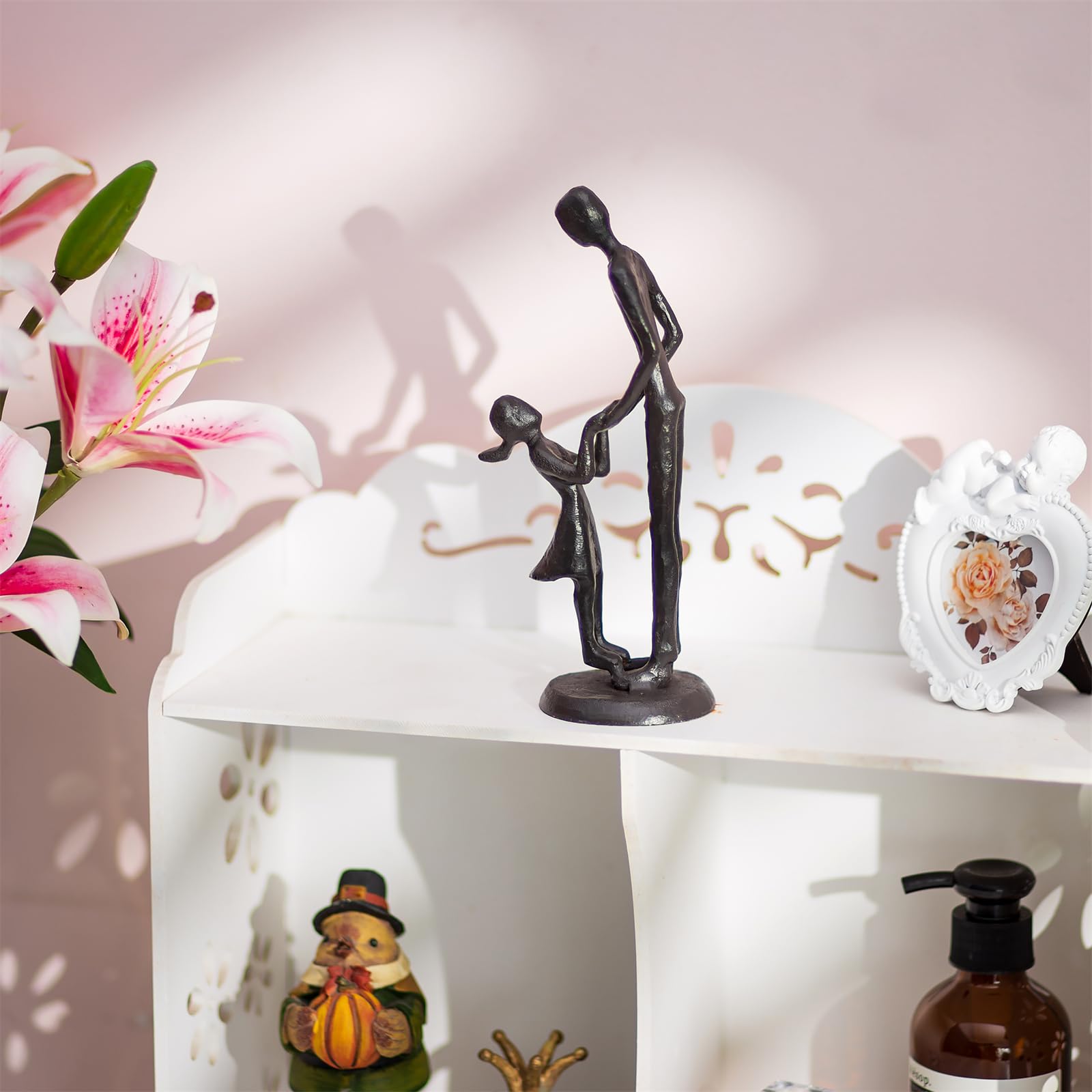 Sziqiqi held in hand for perspective, shows portable keepsake size