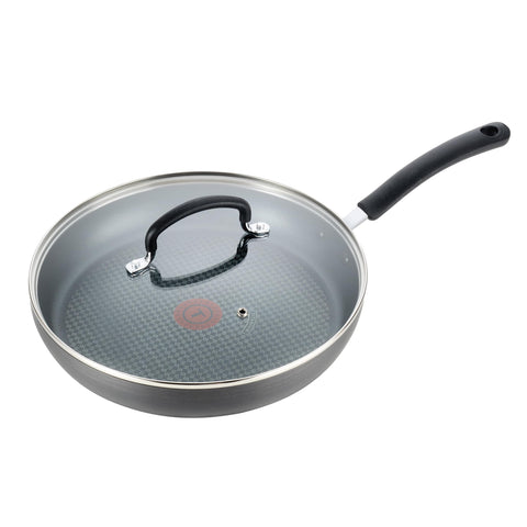 T-Fal 12-inch fry pan front view showing sleek onyx finish and lid benefit