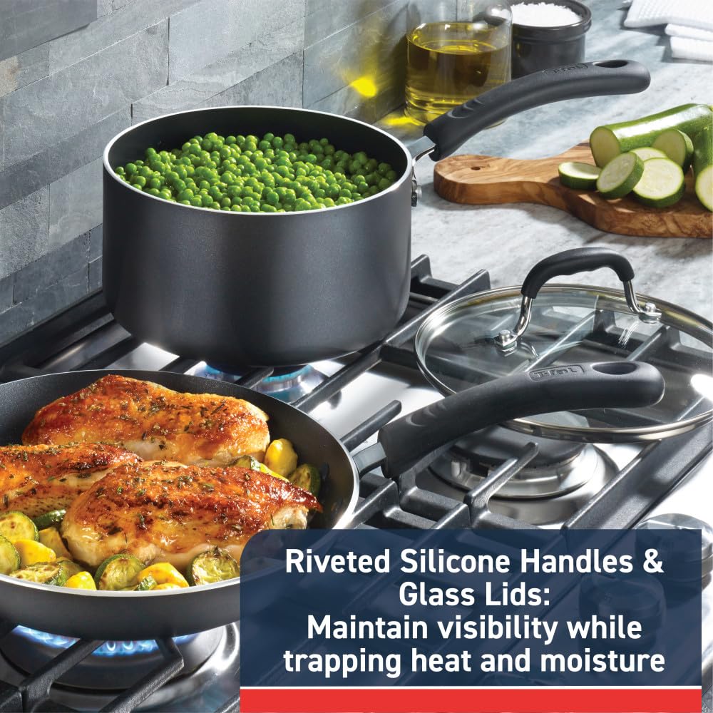 T-Fal ergonomic handles and even-heat bases demonstrating secure grip and anti-warp design
